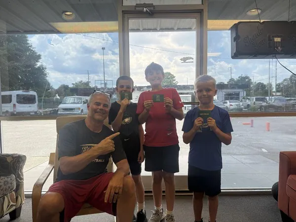 Coach Mike with three FAST kids